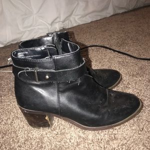 Black booties with brown bottom
